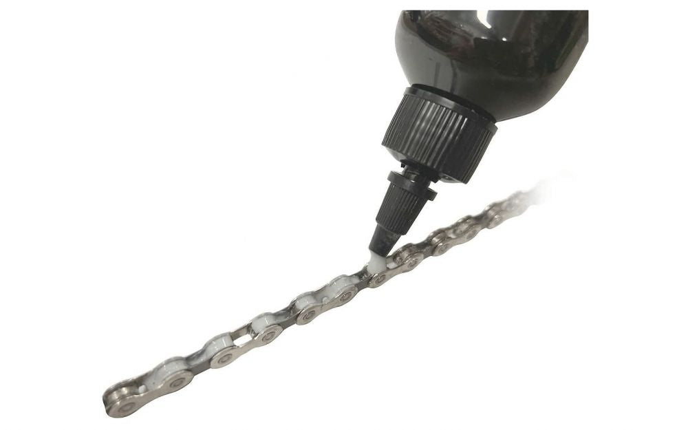 REX Black Magik Drip Wax nestemäinen ketjuvaha, 180 ml
